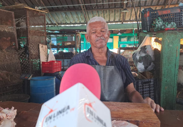 Crisis Mercado Modelo Santo Domingo 2026. • Palabras Clave Secundarias: Precio del pollo RD hoy, inflación República Dominicana mayo 2026, falta de circulante mercado mella, NoticiasEnlineaRD reportaje.