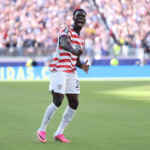 El delantero Folarin Balogun celebrando un gol con la selección de Estados Unidos durante el Mundial 2026.